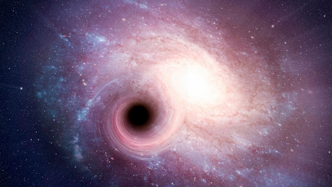 Hallan una conexión entre agujeros negros supermasivos y la forma de las galaxias que los albergan