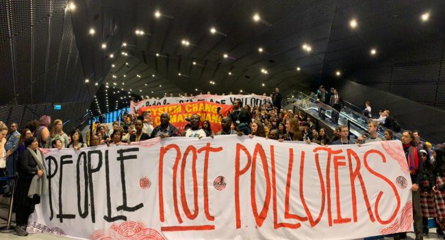 Protesta durante la COP24. Foto: Climate Action Network.
