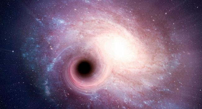 Hallan una conexión entre agujeros negros supermasivos y la forma de las galaxias que los albergan