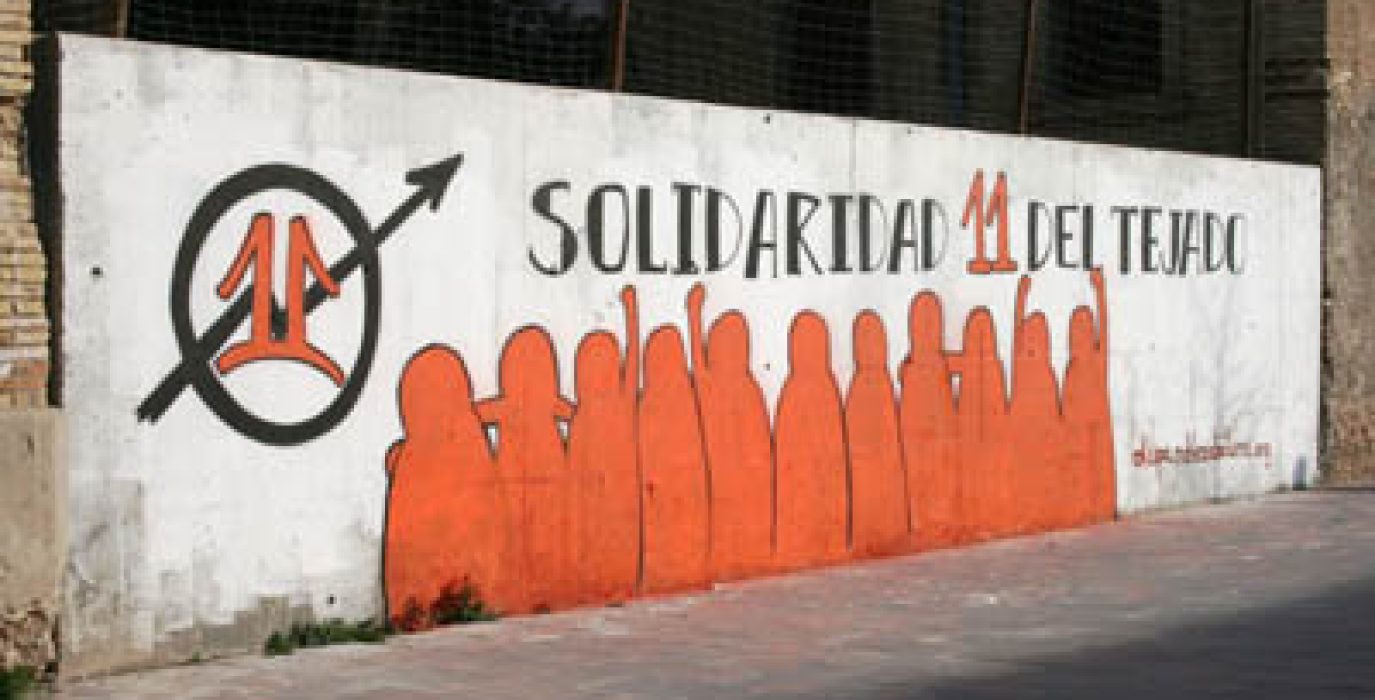 Mural en apoyo de la campaña por 'lxs 11 del tejado'.