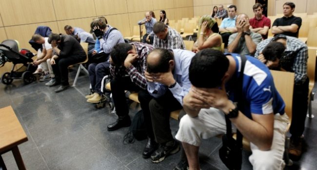 Los acusados durante el juicio.