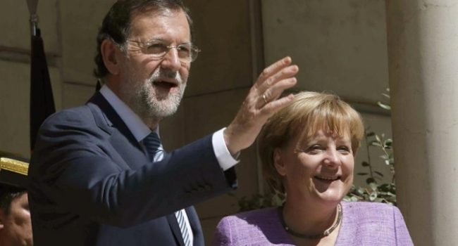 Rajoy y Merkel.