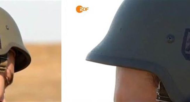 Soldados del gobierno de Poroshenko con simbología nazi en sus cascos. Foto difundida por la televisión alemana ZDF